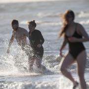 A number of people braved the cold water off the coast of Earnse Bay to start 2024