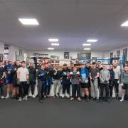 Boxing champion, Matt Windle with Barrow boxers he's invited to join the Barrow Dreams project