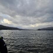 South Lakes Police went to the shore of Windermere after a boat was reported capsized.