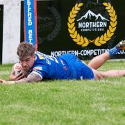 Andrew Bulman dives over the line to score against Featherstone Rovers