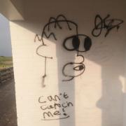 Graffiti at Haverigg shelters.