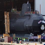 HMS Audacious is taken out of its indoor ship building complex at BAE Systems, Barrow, in 2017