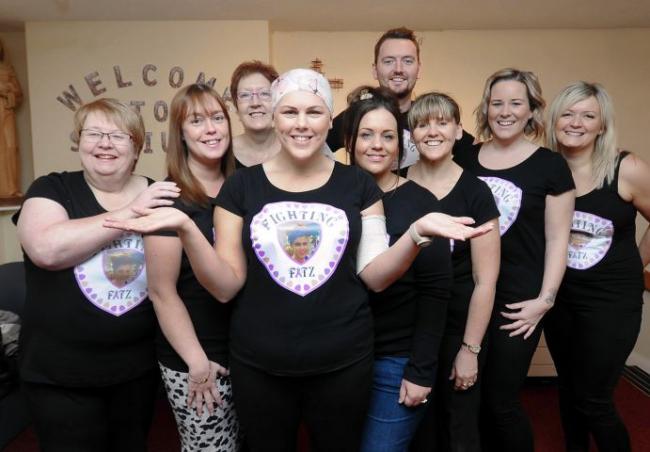 Barrow St Pius X RC Primary School teacher Danielle Fitzsimons who with friends, is planning a year of fundraising events for Cancer Research UK. Danielle who is receiving treatment for breast cancer, is pictured (centre) with her team of fund raisers. JO