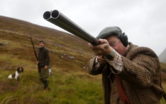 File photo dated 12/8/2014 of Grouse shooter Daniel Parker near Forest Lodge, Blair Atholl on the Glorious Twelfth. The start of the grouse shooting season has reignited the debate over the sport's role in protecting the countryside. PRESS ASSOCIATION Pho